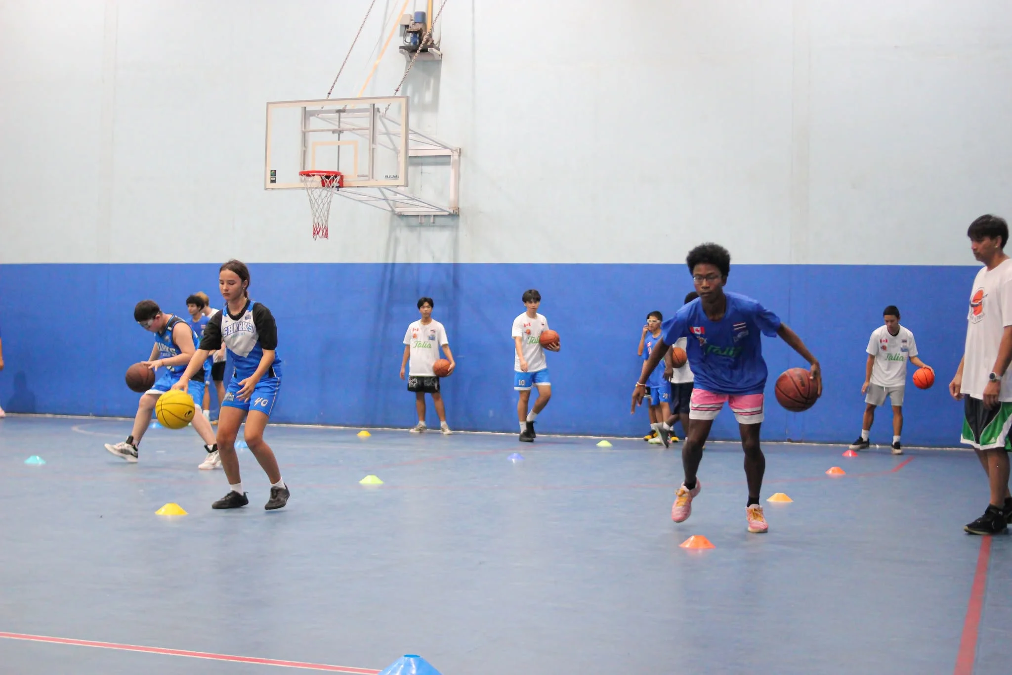 Players working through a dribbling drill